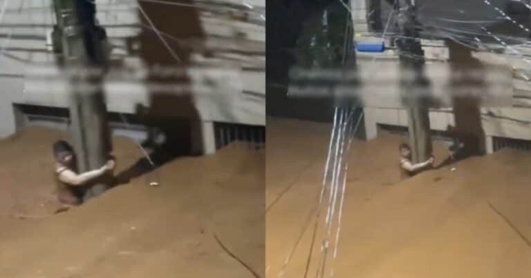 Una mujer aguantó tres horas aferrada a un poste de luz en medio de una terrible inundación