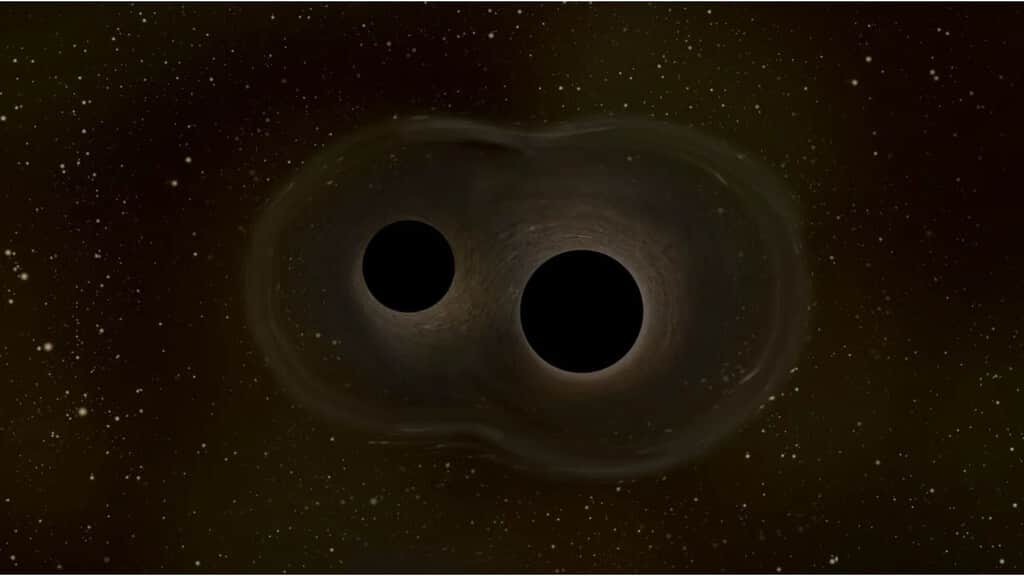 La fusión de agujeros negros que rompió todas las reglas tenía truco: una lente gravitacional pudo haber inflado su tamaño