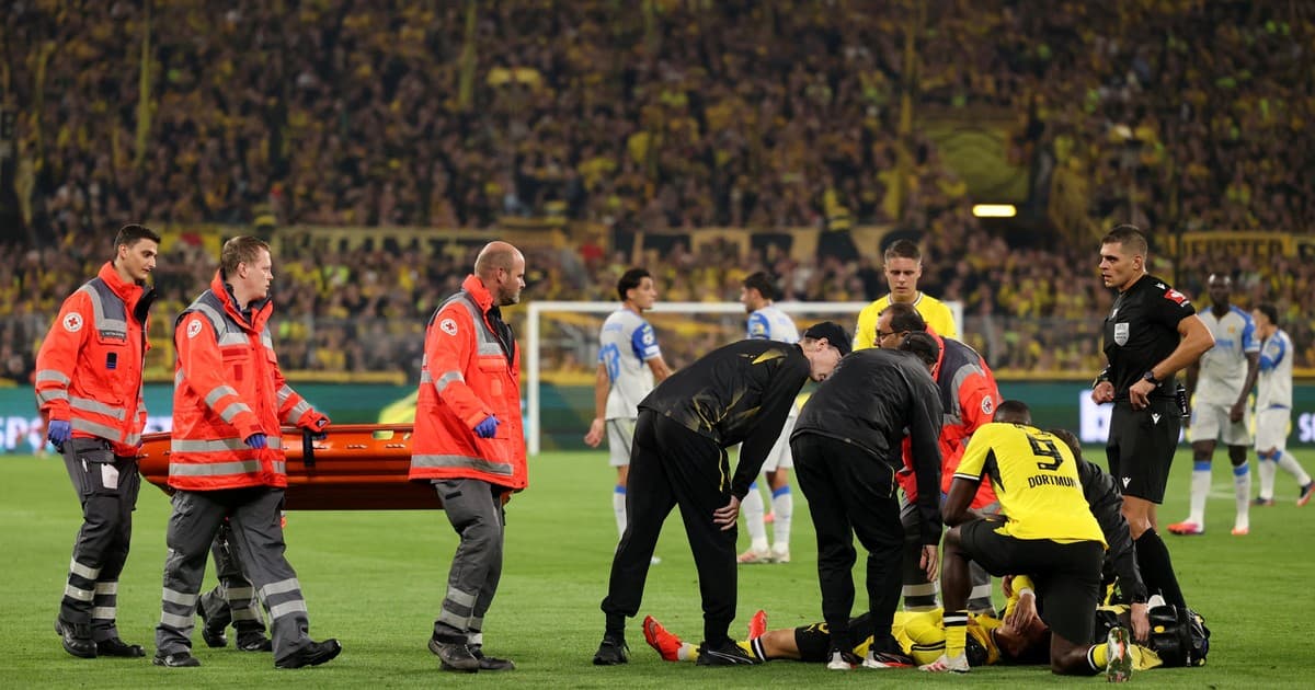 Pánico en la Champions: un jugador del Dortmund se desplomó en pleno partido vs Villarreal y se fue en ambulancia